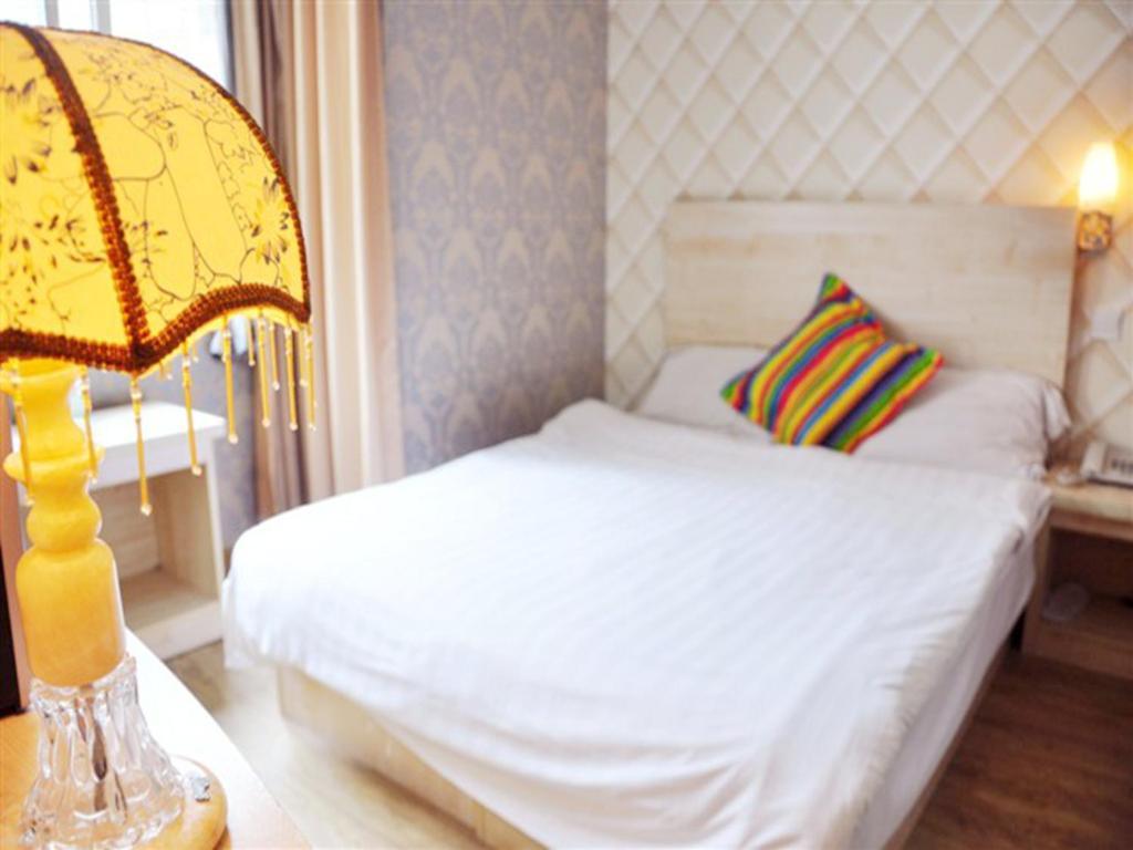 Qingdao Four Seasons Sunshine Business Hotel Rom bilde